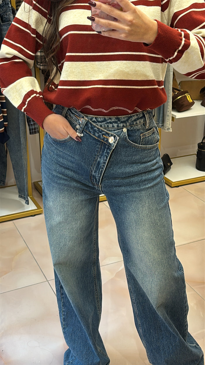 Jeans chiusura asimmetrica